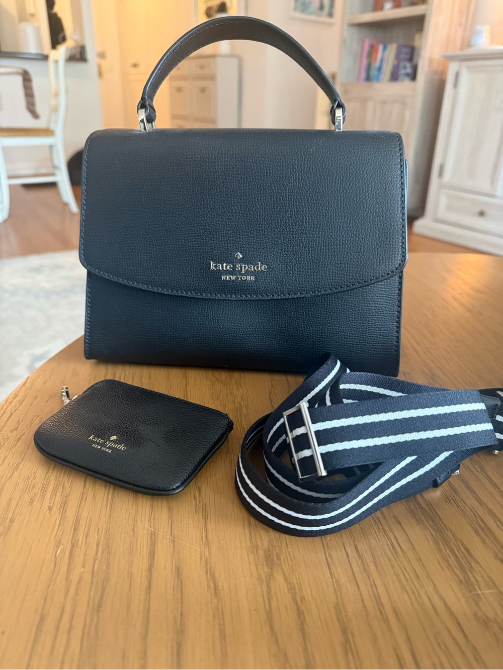 Never Used Kate Spade black leather purse with striped strap and coin purse